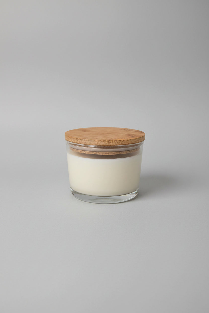 White container with wooden lid on a white background